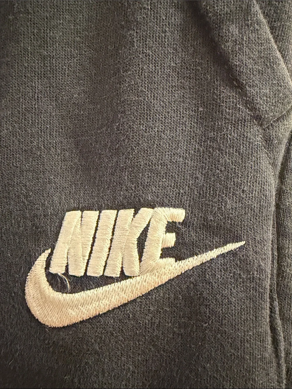 Nike Kids Black Sweatpants with White Swoosh